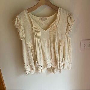 Cream Ruffled Cap Sleeve Blouse with Pleated Details